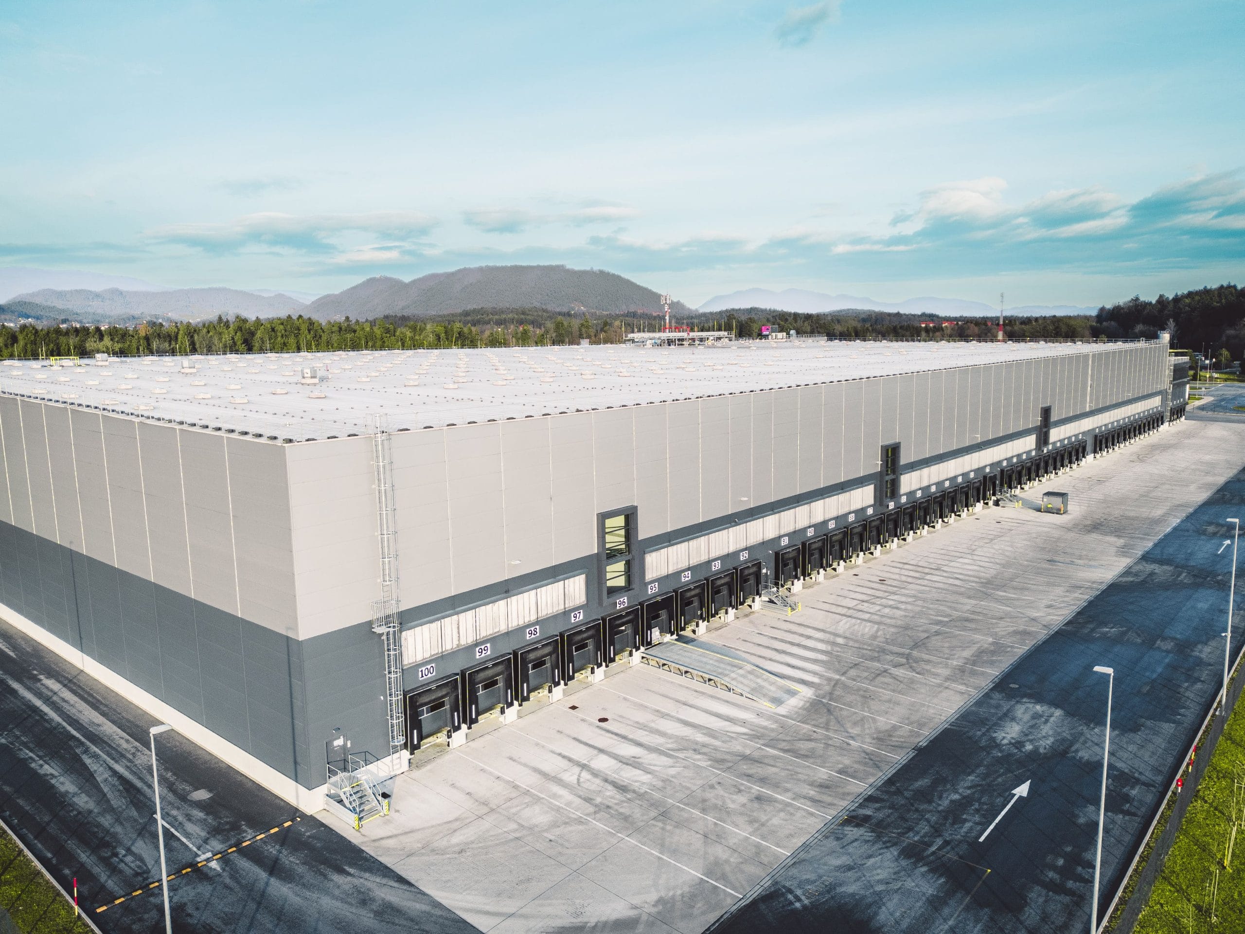 aerial-view-loading-docks-on-the-side-of-the-buil-2023-11-27-05-09-20-utc (1)